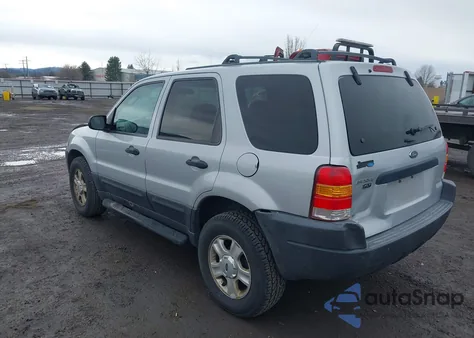 2003 Ford Escape Xlt z USA, uszkodzony, nr VIN 1FMYU03193KA78387